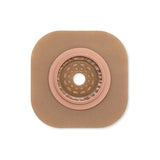 Square hydrocolloid ostomy barrier with round central opening on white background