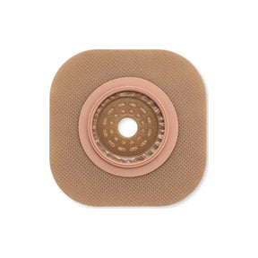Square hydrocolloid ostomy barrier with round central opening on white background