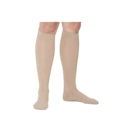 Beige knee-high medical compression socks for leg support
