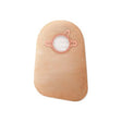 Beige ostomy pouch with round flange for stoma care, medical supply product