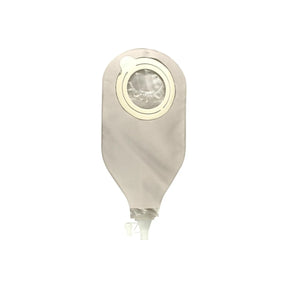 Closed beige medical ostomy drainage bag with circular adhesive and tap valve on white background