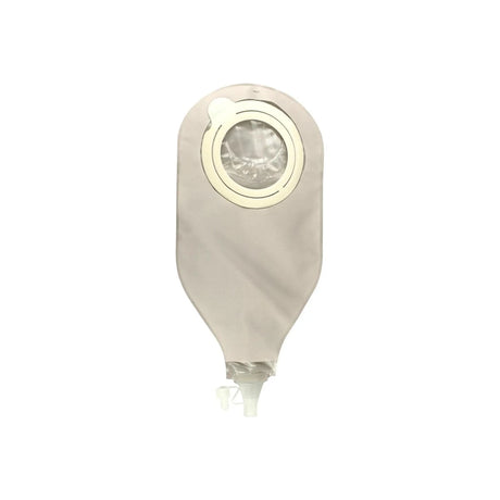 Closed beige medical ostomy drainage bag with circular adhesive and tap valve on white background