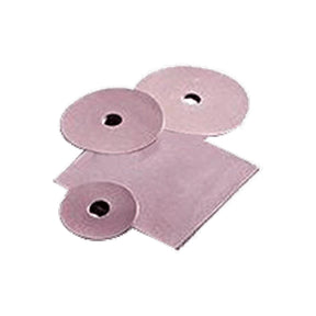 Assorted pink ostomy barrier rings and sheets on white background, medical supplies
