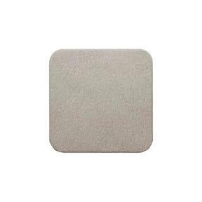 Square beige medical foam dressing with rounded edges on white background