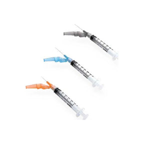 Three medical syringes with colored safety caps, used for home injection therapy.