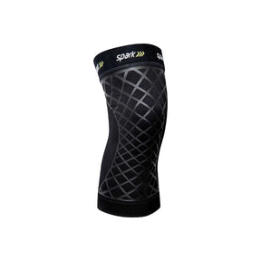 Black elastic knee sleeve with grid support pattern for joint compression and pain relief