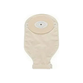 Beige drainable ostomy pouch with adhesive barrier for medical use on white background.