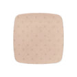 Beige hydrocolloid wound dressing pad, square with rounded edges, isolated on white background
