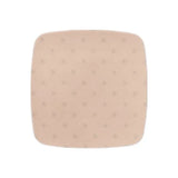 Beige hydrocolloid wound dressing pad, square with rounded edges, isolated on white background