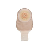 Drainable beige ostomy pouch with adhesive barrier for stoma care on white background
