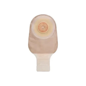 Drainable beige ostomy pouch with adhesive barrier for stoma care on white background