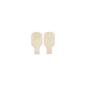 Pair of beige ostomy pouches with adhesive barriers for medical use on white background