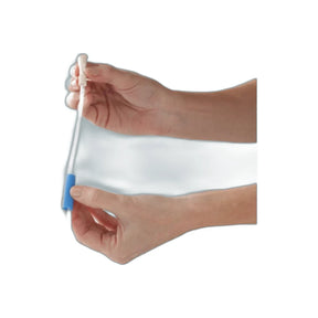 Hands holding a medical catheter with blue grip for home healthcare use