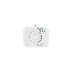 Microskin ostomy barrier with adhesive ring for stoma care on white background