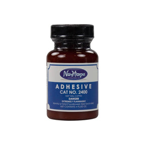 Nu-Hope adhesive bottle for medical supplies, category number 2400, 4 fluid ounces