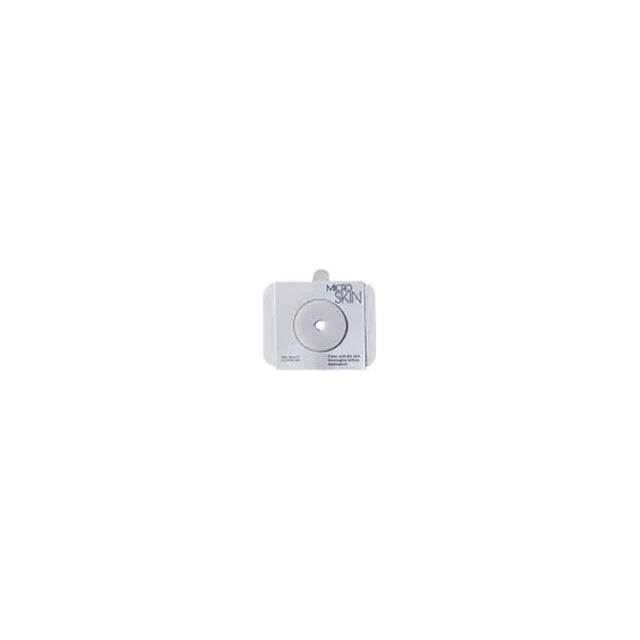 Rectangular ostomy barrier with round opening, Microskin text visible, white background