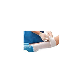 Caregiver applying medical bandage to patient's leg with orthopedic sock