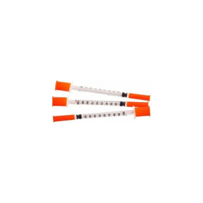 Three medical syringes with orange safety caps, essential home care supplies