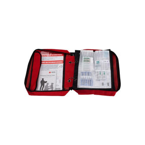 Open red first aid kit with medical supplies, bandages, and emergency guide visible