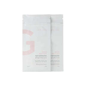 Two packs of ZitSticka Goo Getter spot clarifying dots for skin, white packaging.