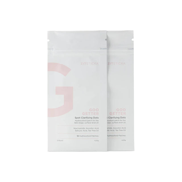 Two packs of ZitSticka Goo Getter spot clarifying dots for skin, white packaging.