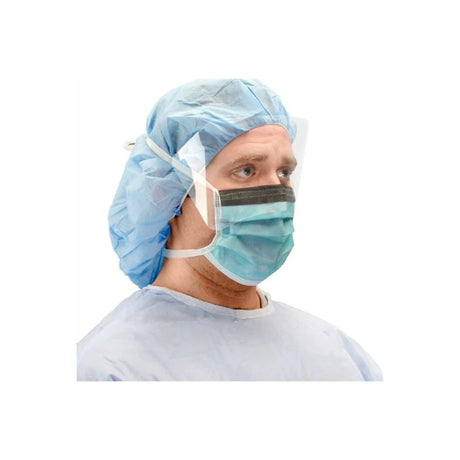 Healthcare worker wearing face shield, surgical mask, blue cap, and gown for infection protection