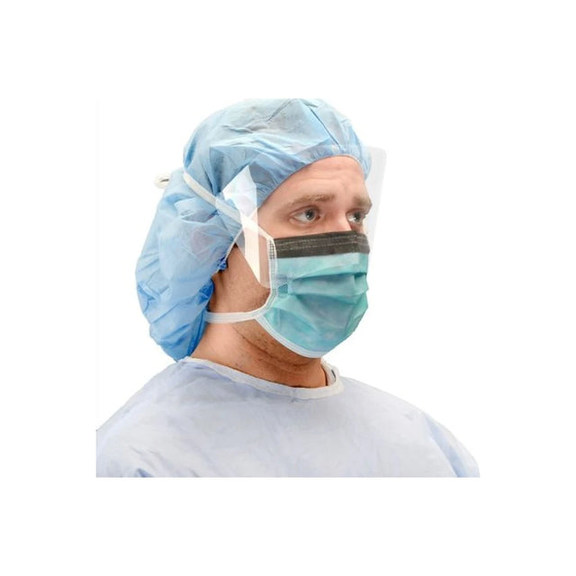 Healthcare worker wearing face shield, surgical mask, blue cap, and gown for infection protection
