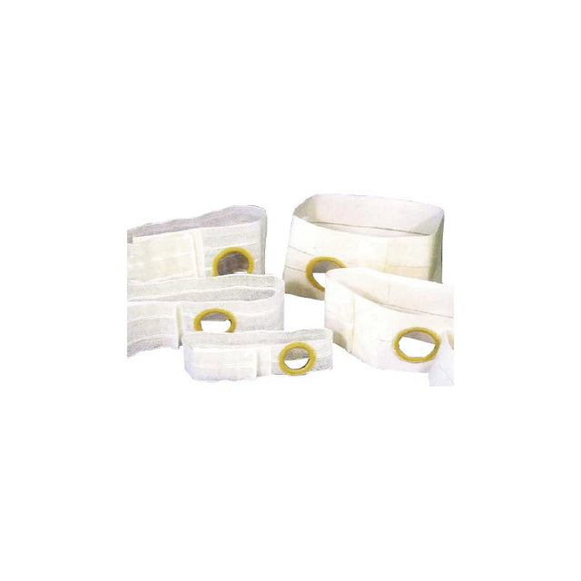 Assorted ostomy belts with round openings for medical stoma support, white background