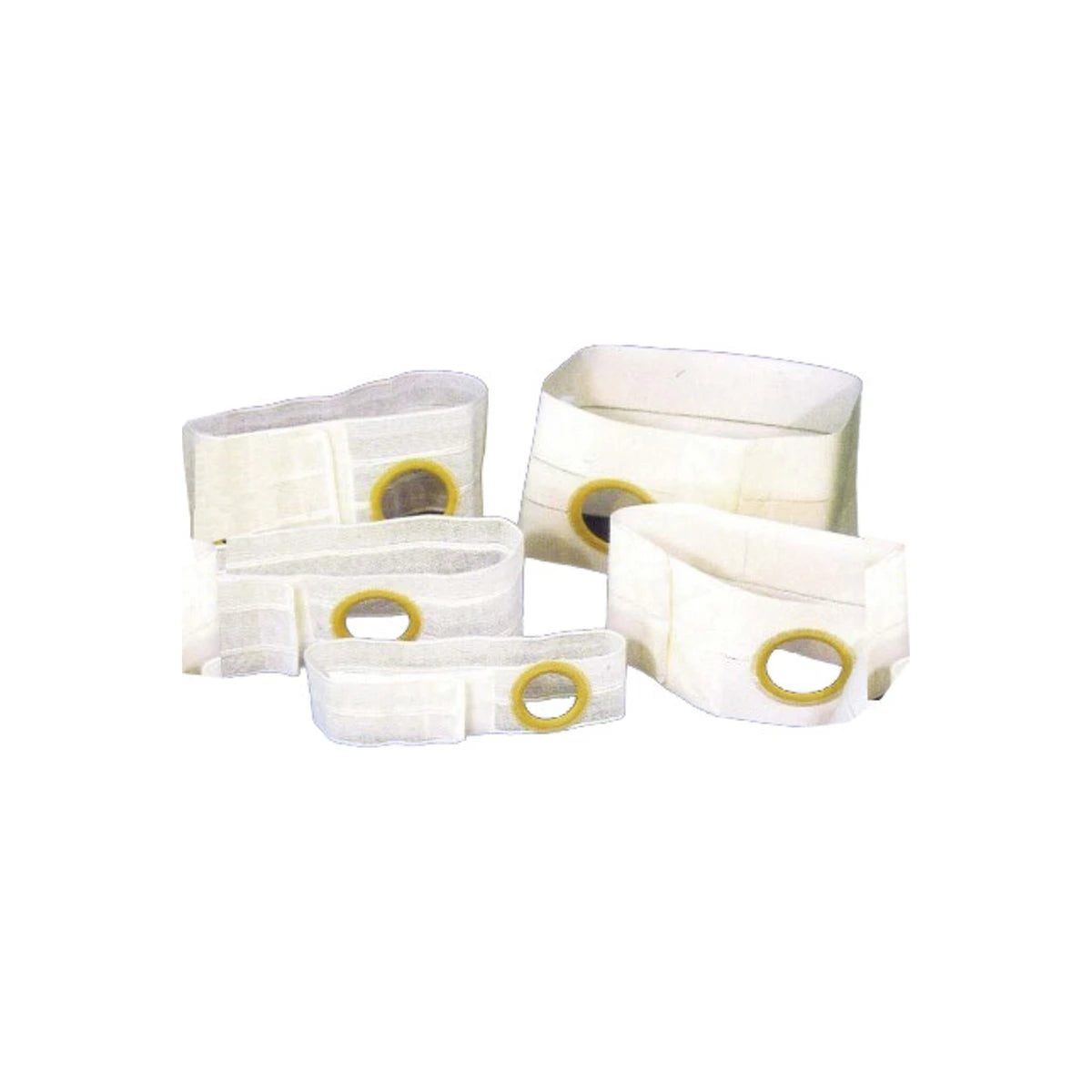 Assorted white ostomy belts with circular openings for ostomy care, medical supplies
