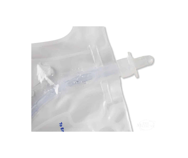 Transparent medical fluid drainage bag with tube connector close-up