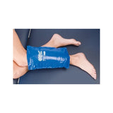 Reusable blue cold therapy pack applied to a person's knee for pain relief