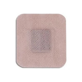Beige square adhesive wound dressing with absorbent pad center for medical use