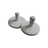 Pair of white personal medical device accessories with ventilation holes on a white background