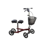 Knee walker scooter with padded seat, basket, and four wheels for mobility support