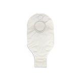 Transparent ostomy pouch with circular flange, medical supply on white background