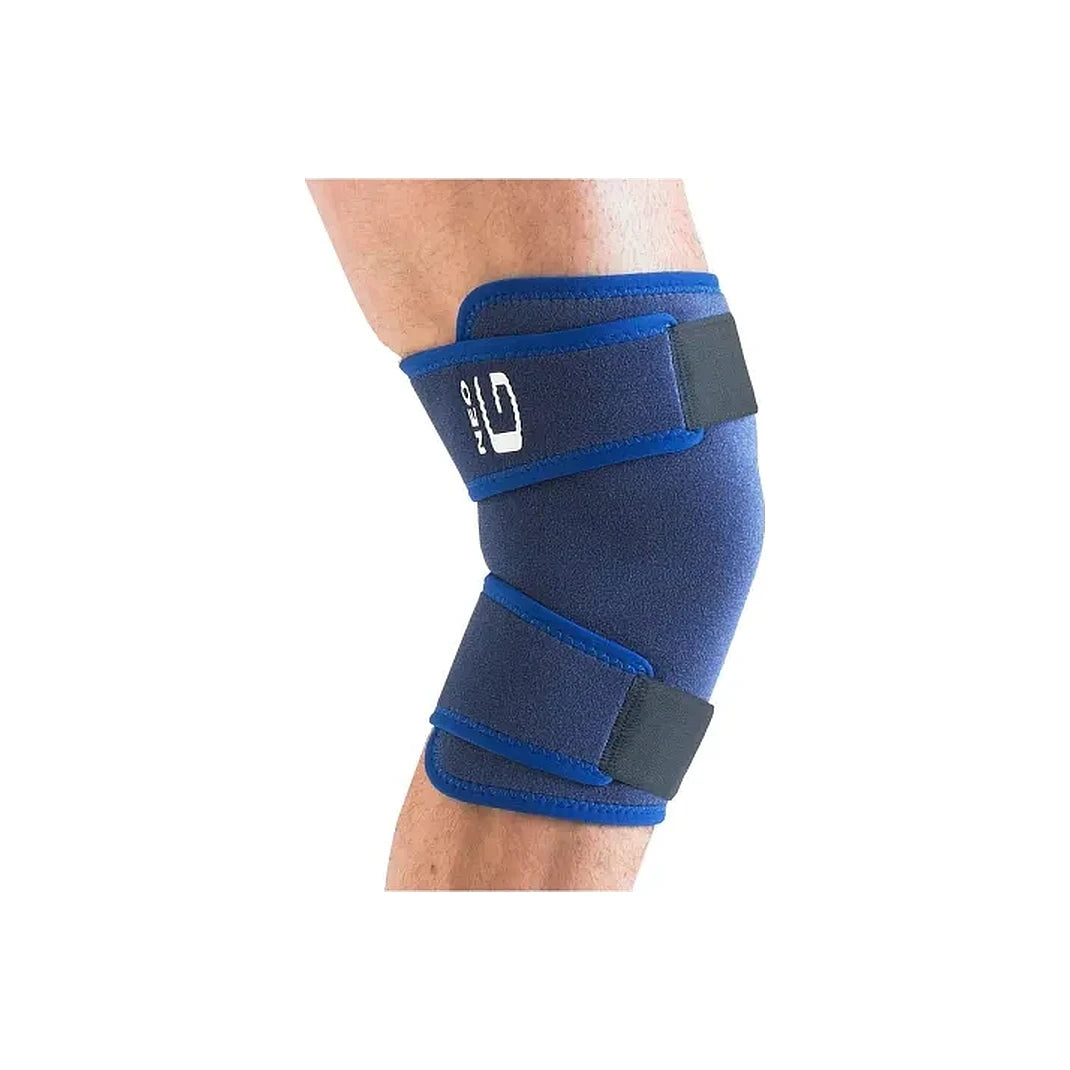 Adjustable blue knee support brace with velcro straps on a person's leg