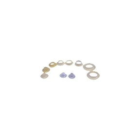 Assorted ostomy barrier rings and convex seals for medical supply needs on white background
