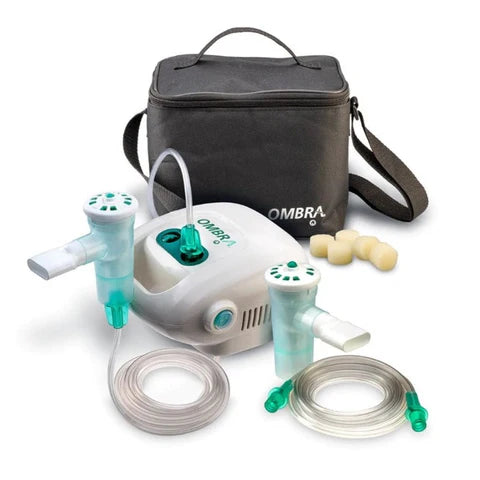 Tabletop nebulizer compressor system with mask, tubing, carry case, and accessories.