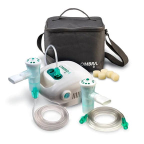 Tabletop nebulizer compressor system with mask, tubing, carry case, and accessories.