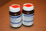 Two Derma Pak-its plain packing strip sterile medical supply bottles with white caps