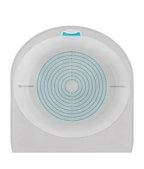 Adhesive ostomy barrier with concentric circles for precise fitting, used in stoma care