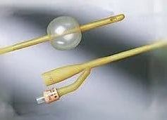 Close-up of two yellow Foley catheters with inflatable balloons for medical use