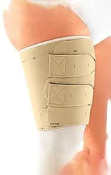 Medical thigh compression wrap with adjustable straps on upper leg