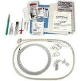 Medical supply kit with feeding tube, syringes, gloves, wipes, and instruction booklet.