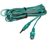 Green audio extension cable with male and female connectors, coiled for use with medical devices