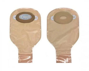 Two beige ostomy bags with adhesive flanges for medical use, displayed on a white background.