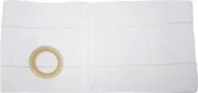 white medical ostomy barrier pad with adhesive ring for stoma care on plain background