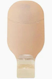 Beige medical ostomy bag with drainable closure for ostomy care on white background.