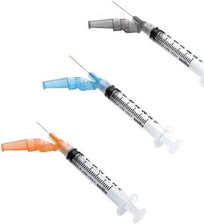 Three medical syringes with colored safety caps for home healthcare and medication delivery