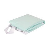 Folded light green medical patient transfer sheet with white handles on white background